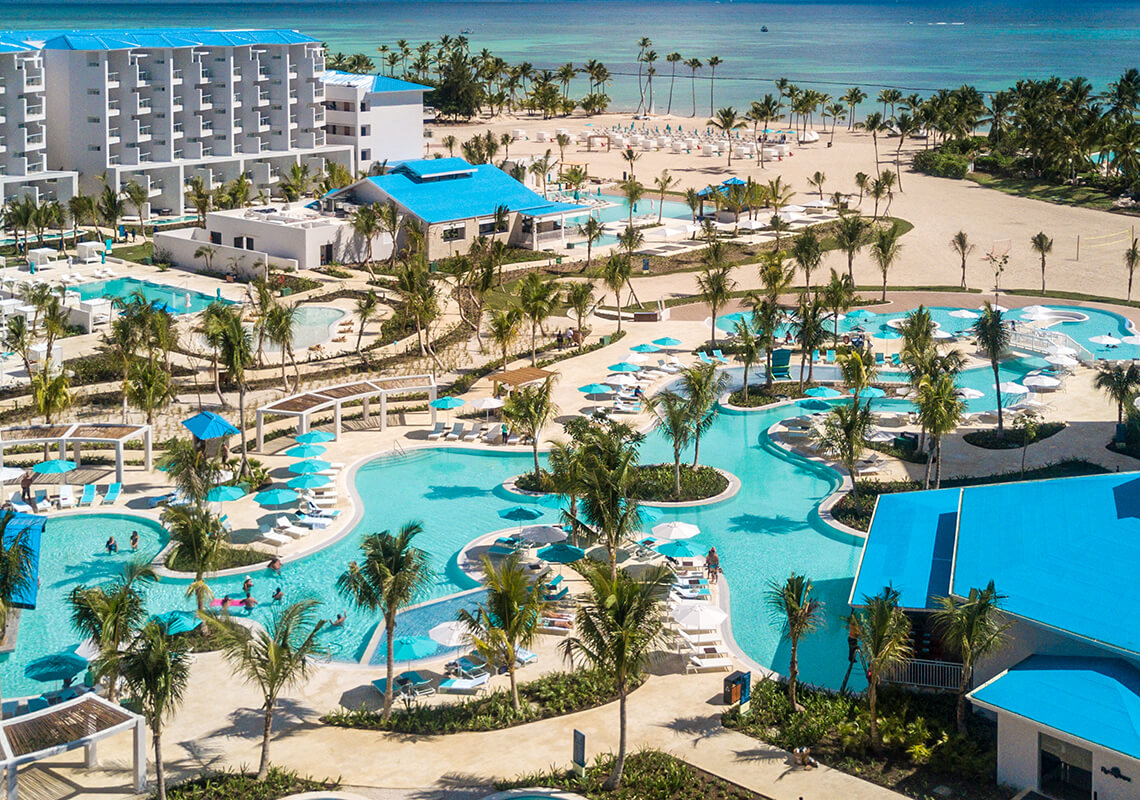 An aerial view of Margaritaville Island Reserve Cap Cana - Hammock with a pool, beach, and wedding venue.