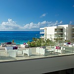 A view of the ocean from a balcony at an all-inclusive resort, ideal for a destify wedding.