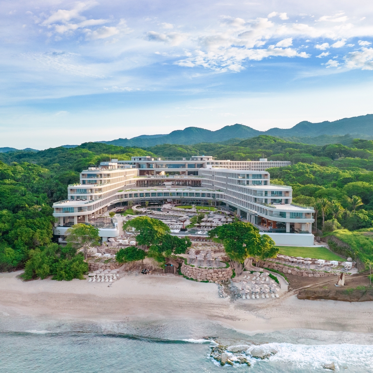 A stunning hotel on the beach, offering wedding packages at Dreams Resorts.