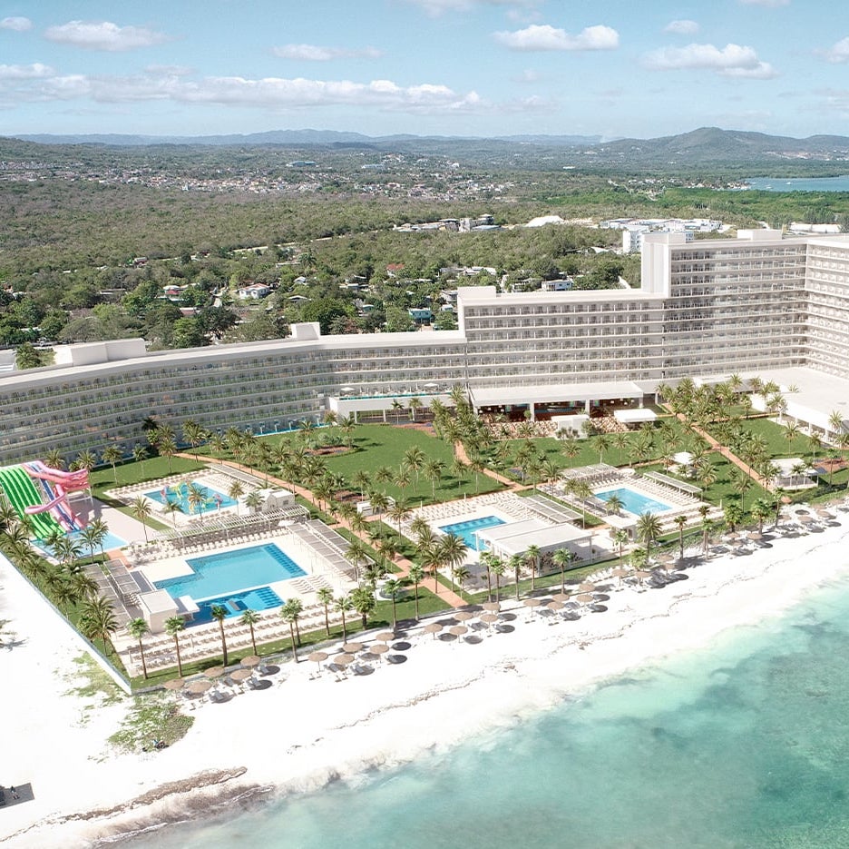 Aerial view of Riu Aquarelle resort by the beach.
