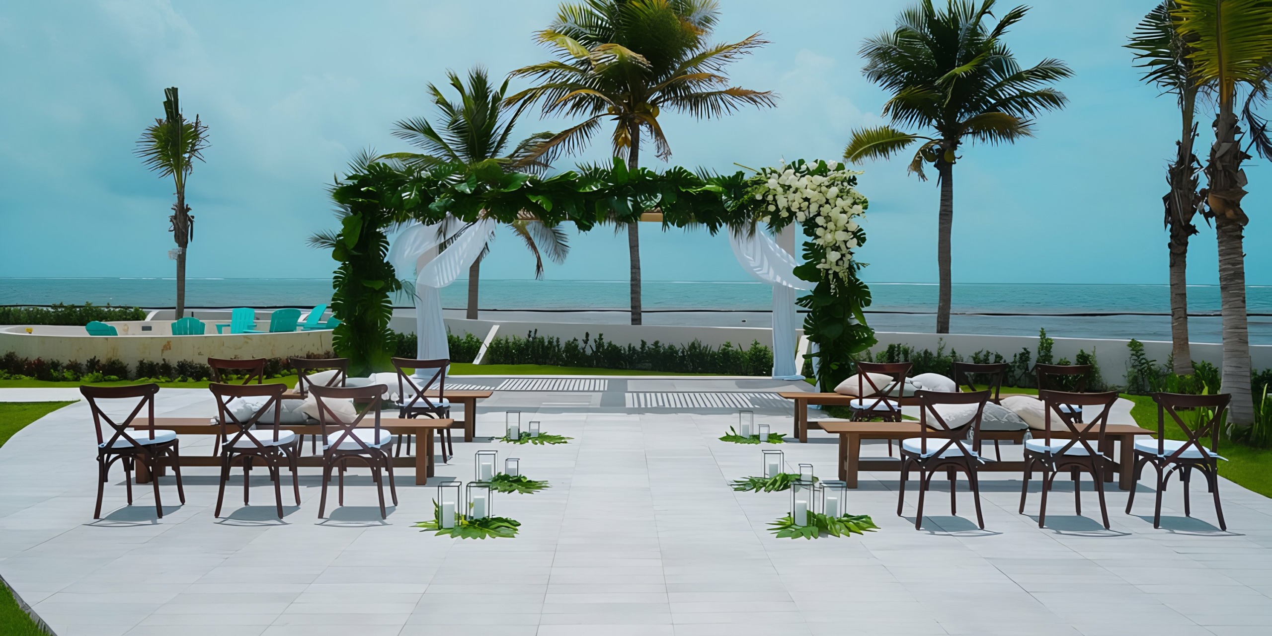 A Margaritaville Island Reserve Riviera Maya wedding ceremony set up in front of the ocean.