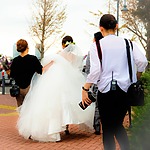 A woman in a wedding dress, ready to save the wedding.