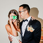 A couple captures a moment at their wedding venue.