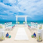 A stunning beach wedding ceremony set up on the sand in one of the breathtaking wedding venues in Montego Bay.