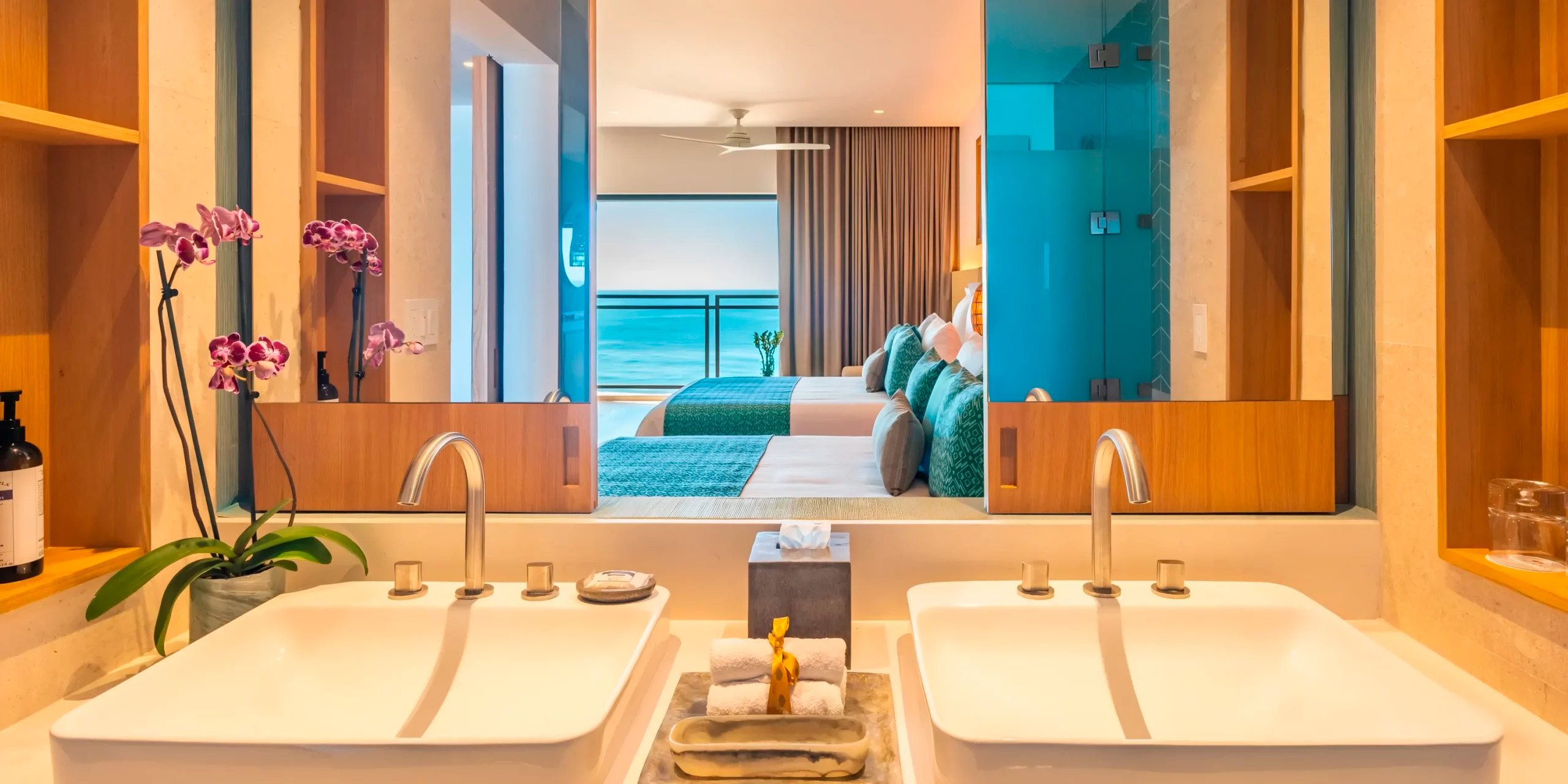 Dreams Estrella del Mar Mazatlán: Perfect for your destination wedding, featuring an ocean view room with a balcony, double sinks, and a luxurious bed.