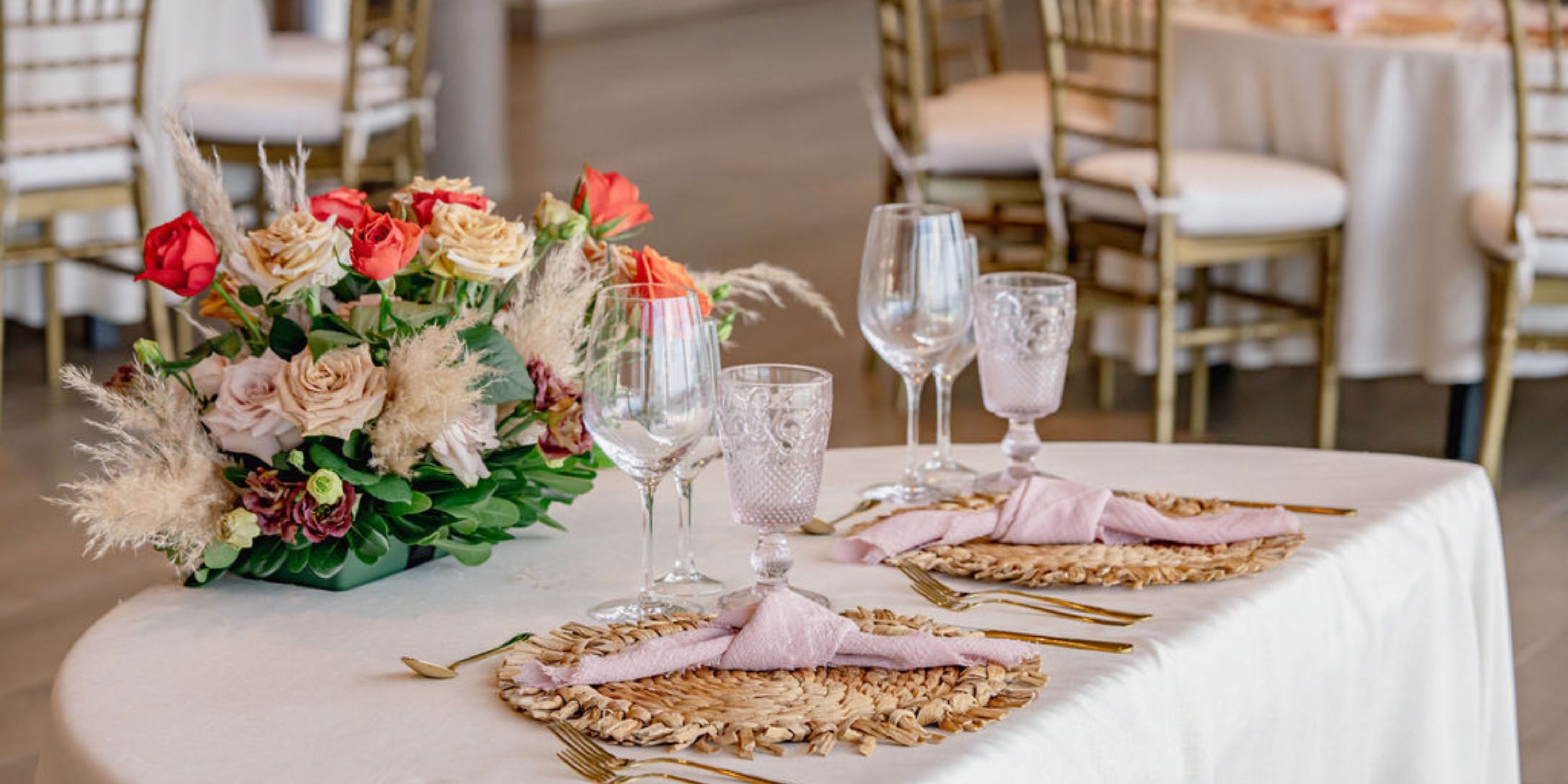 Elegant table set for two at Hilton Cancun Mar Caribe, perfect for a destination wedding dinner.