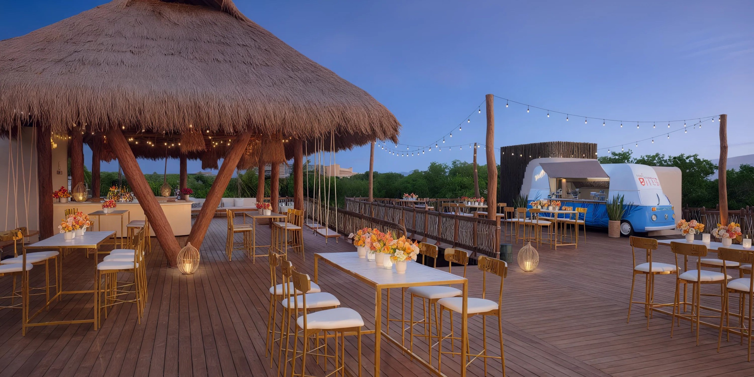 A wooden deck featuring a thatched-roof bar, floral-adorned tables, string lights, and a small trailer in the background with a clear sky are seen at Hyatt Vivid Grand Island.