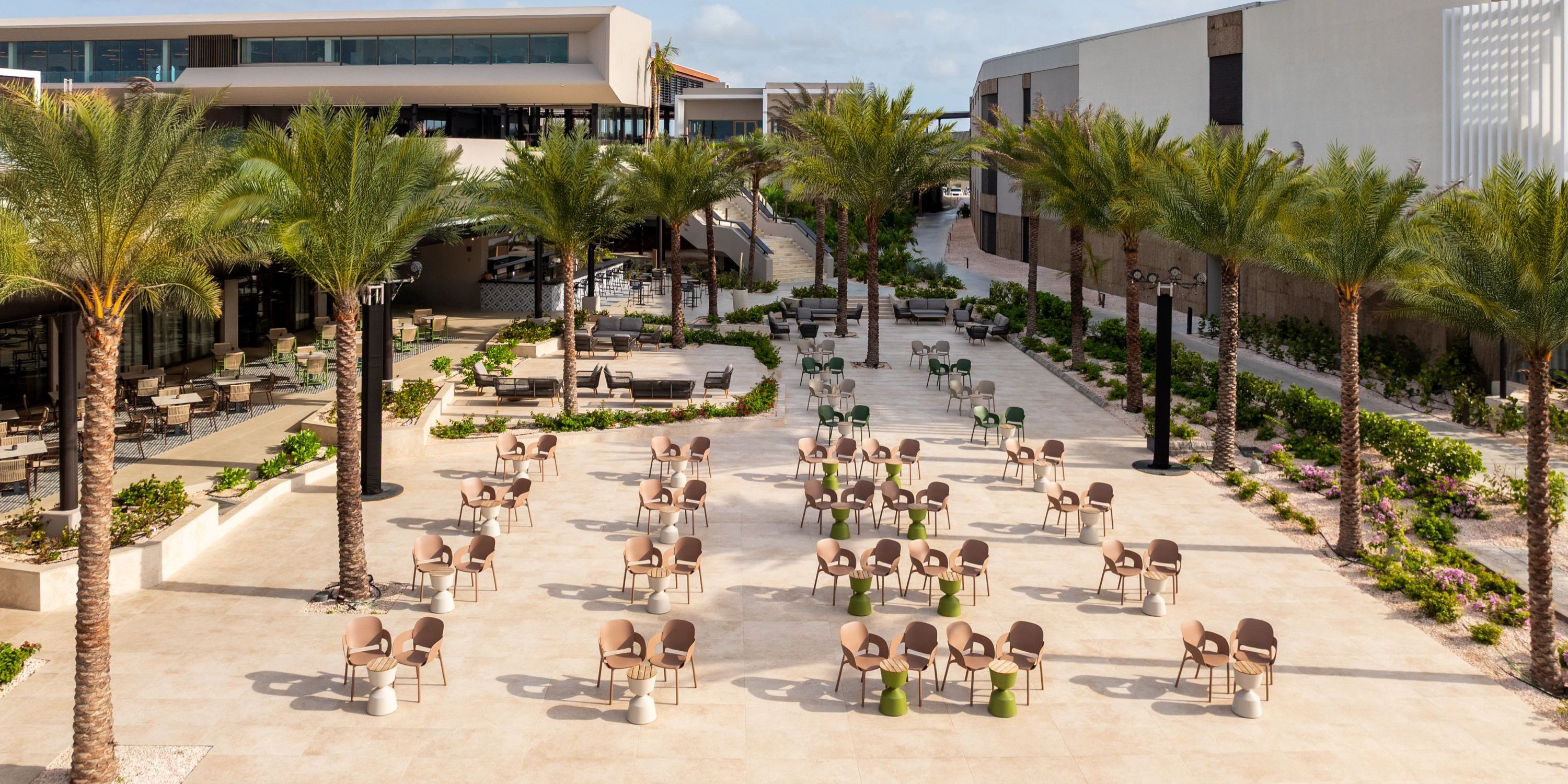 Secrets Baby Beach Aruba features an outdoor courtyard ideal for a destination wedding with palm views.