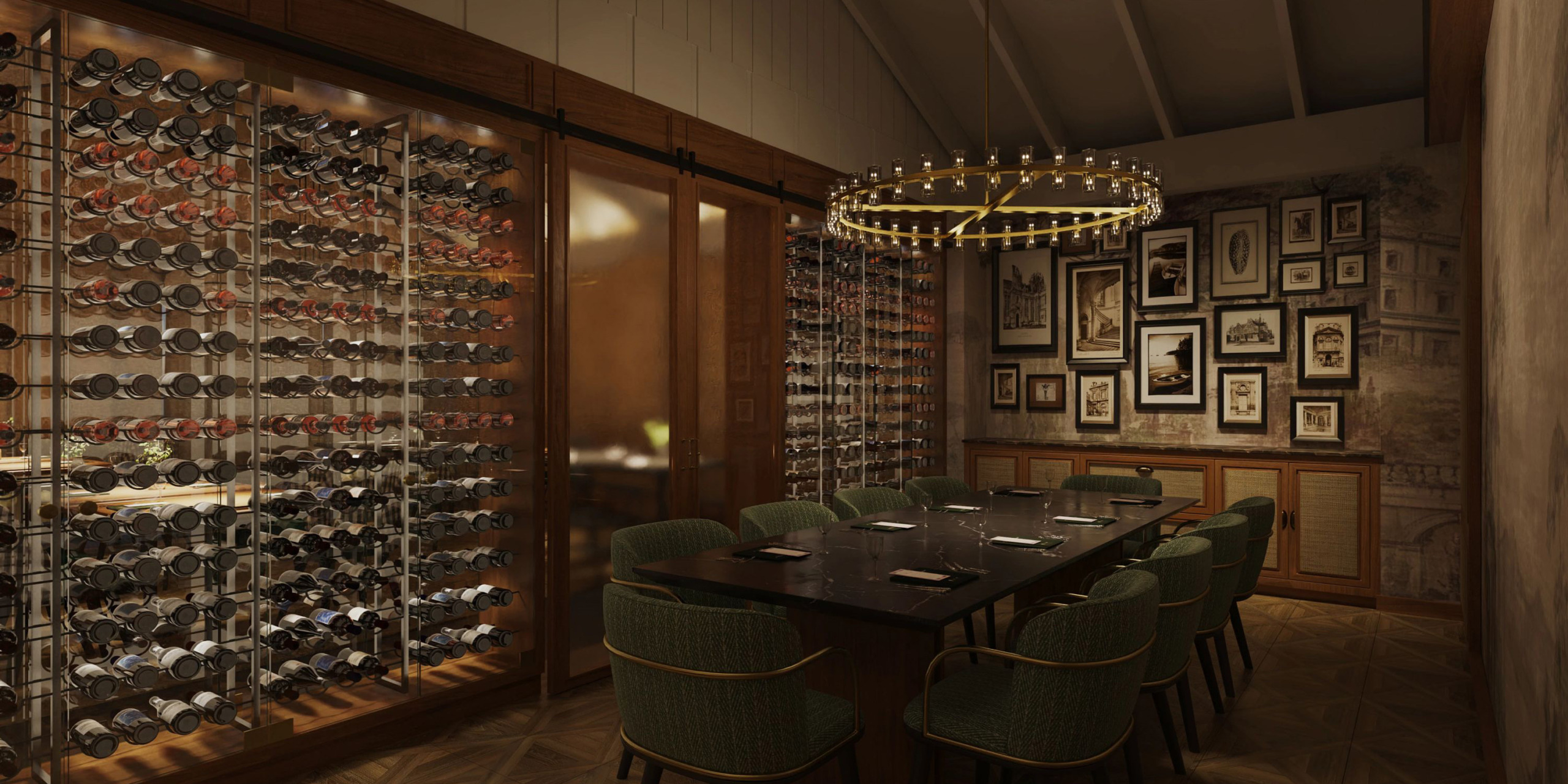The Secrets St Lucia wine cellar dining room features a long table surrounded by green chairs, with a circular chandelier overhead. The walls are elegantly adorned with wine bottles and framed pictures.