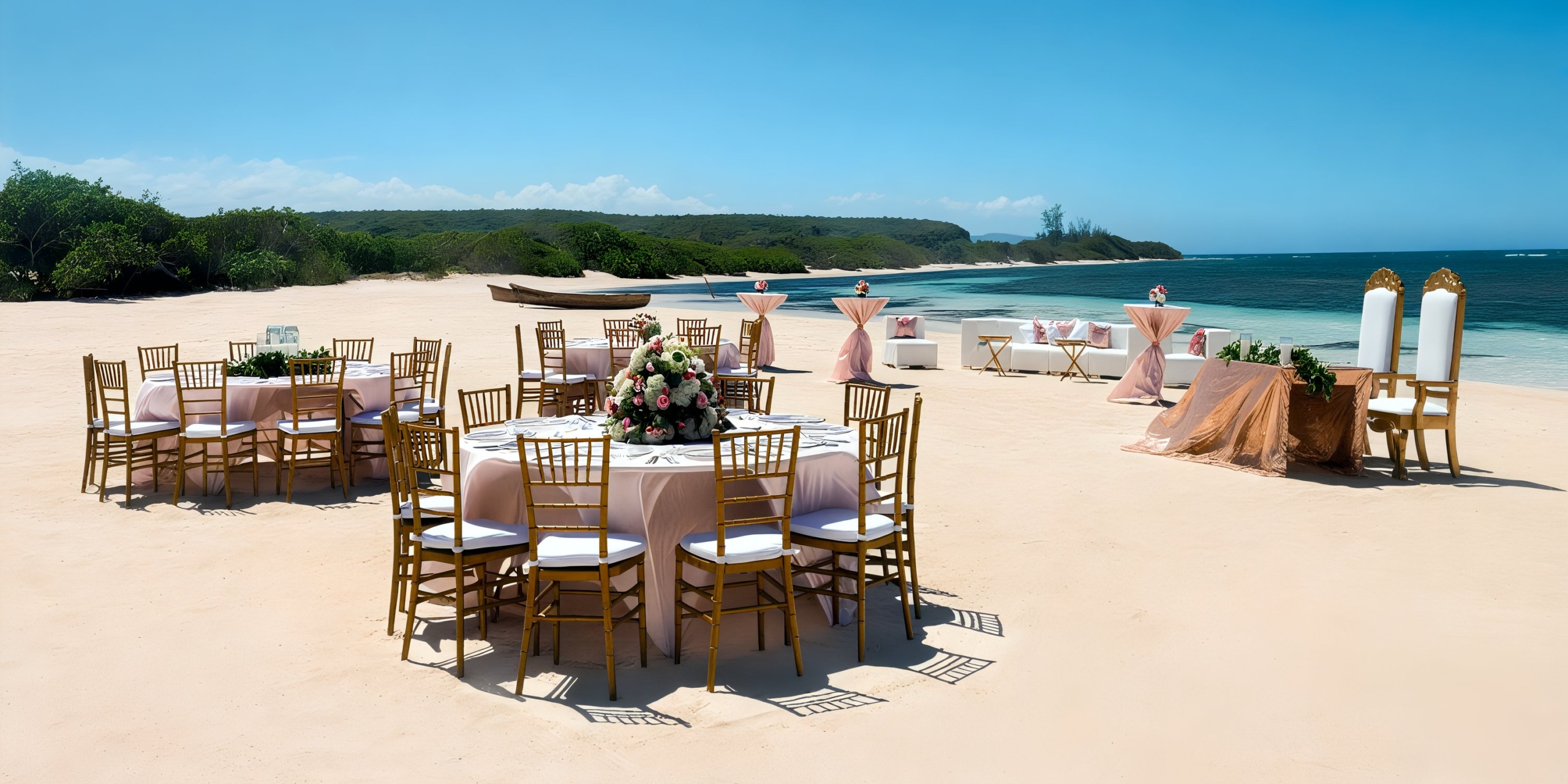 Ocean Eden Bay offers a stunning beach wedding setup, featuring round tables with gold chairs and beautiful floral centerpieces. The ceremony area includes a table adorned with tall candles, all set against the breathtaking backdrop of a blue ocean and clear sky.