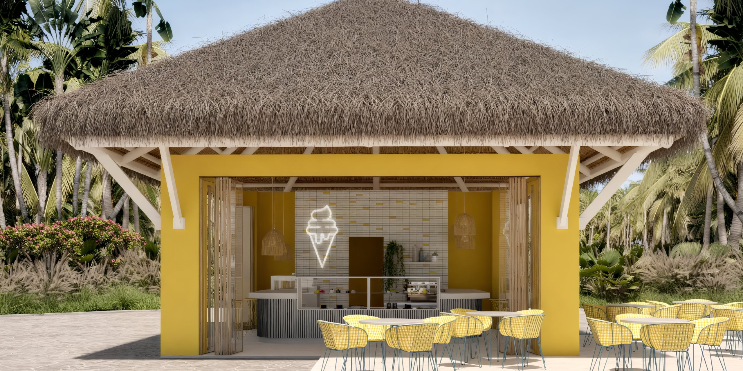 Dreams Playa Esmeralda: A charming yellow ice cream kiosk with a thatched roof and outdoor seating, perfect for enjoying sweet treats during your destination wedding.