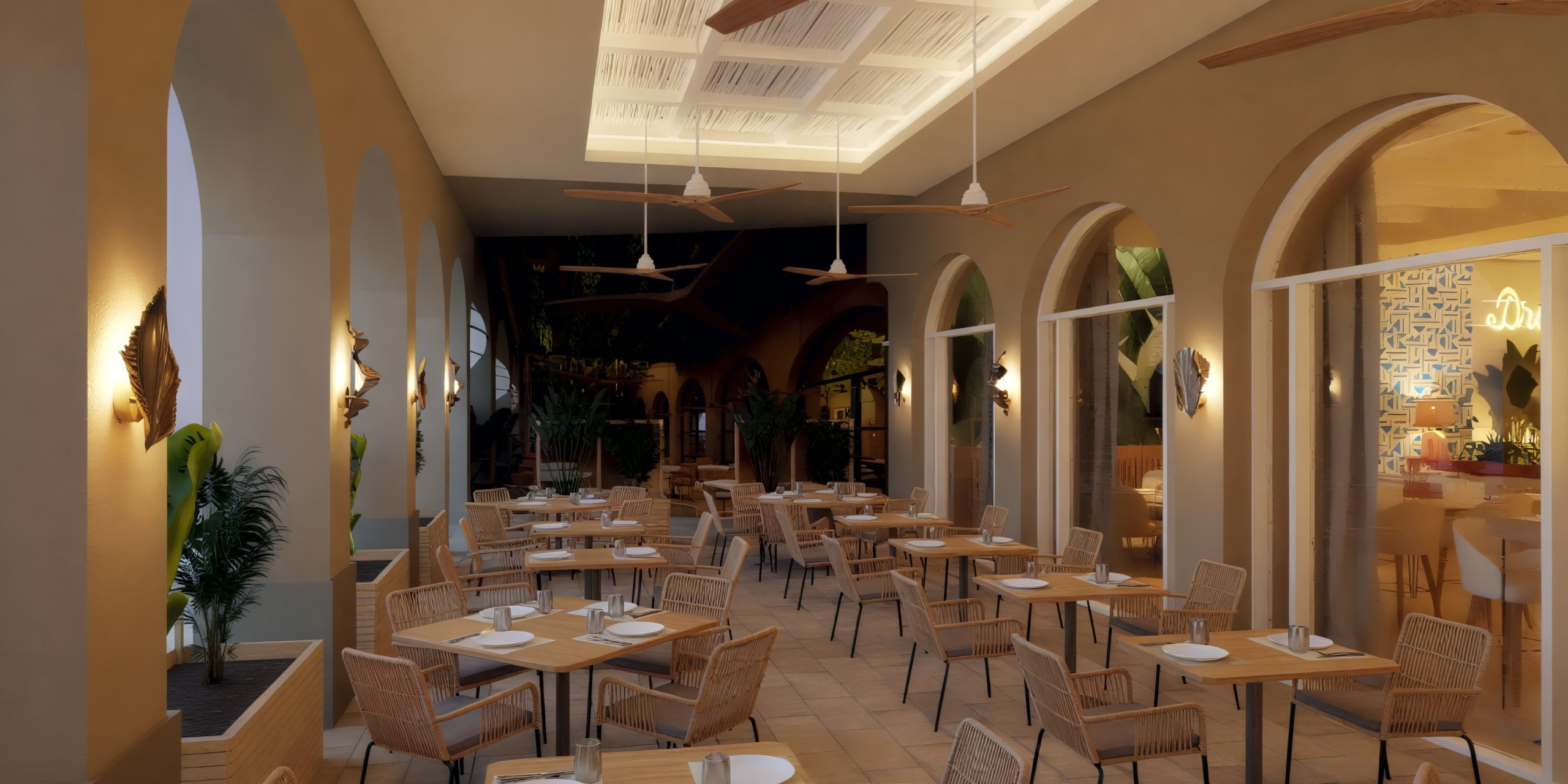 Dreams Playa Esmeralda: Perfect for a destination wedding, featuring outdoor seating with elegant wicker chairs and wooden dining tables.