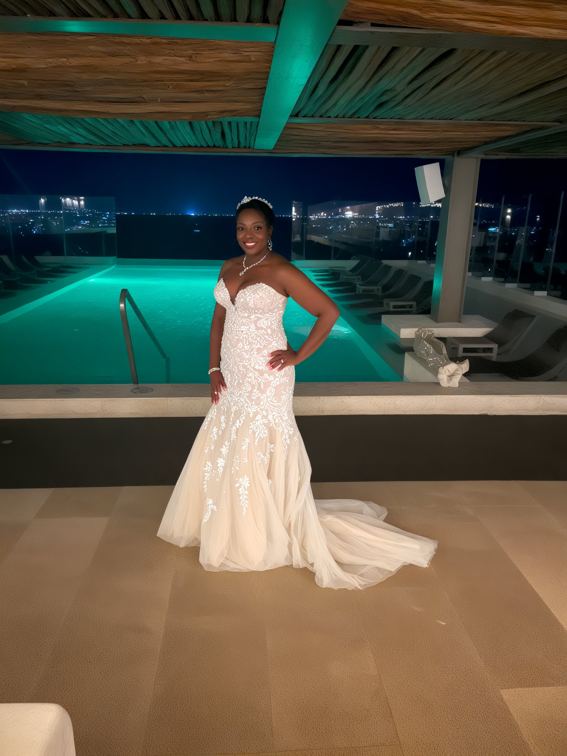 Sheneka and Andre stood by the shimmering pool under the night sky, with Sheneka resplendent in a white gown. The idyllic scene seemed straight out of a destination wedding brochure.