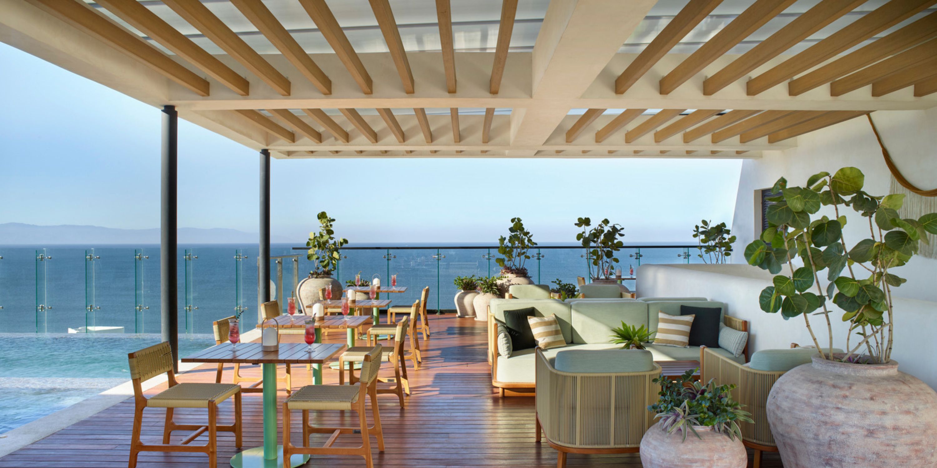 Stylish terrace at UNICO 20°105° Riviera Nayarit set for a destination wedding, with ocean views.