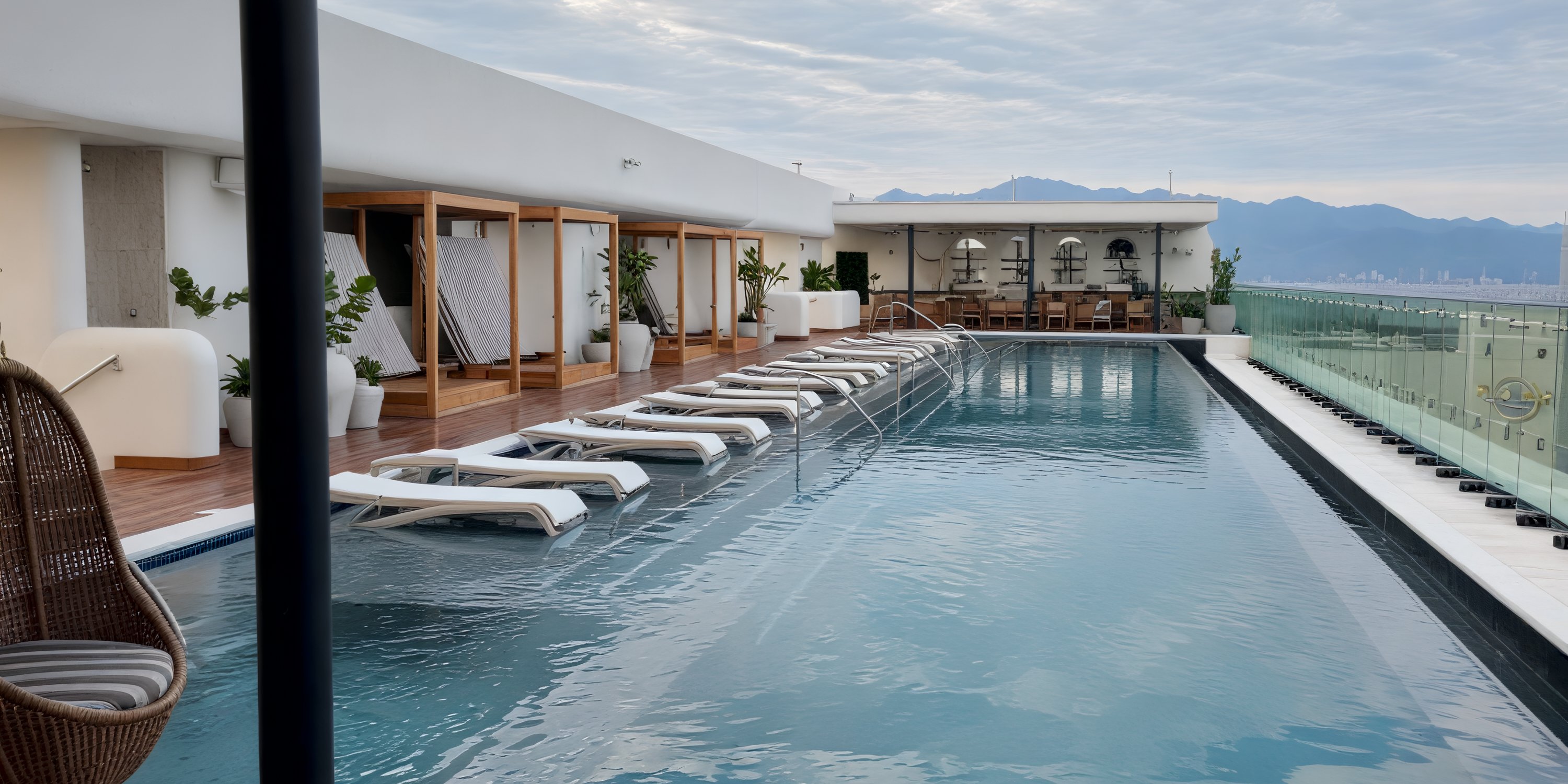 Rooftop pool at UNICO 20°105° Riviera Nayarit, perfect for a destination wedding with views and cabanas.