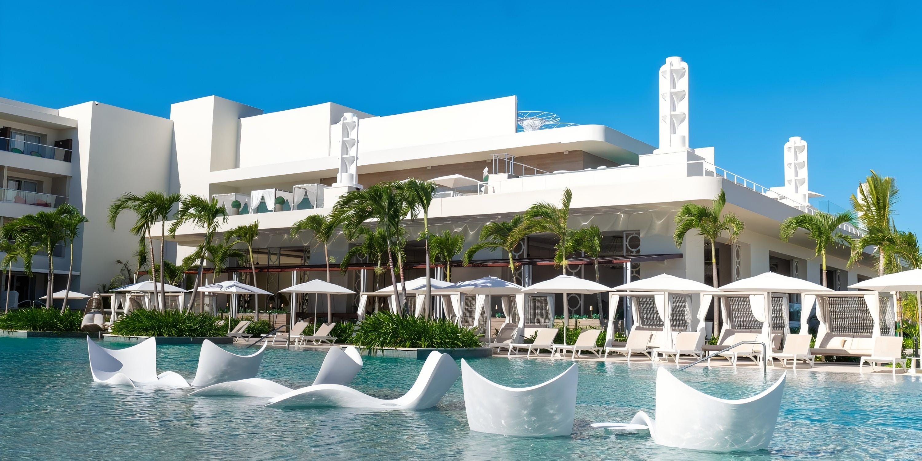 Princess Senses The Mangrove Hotel is a dreamy destination wedding spot with poolside loungers and palms.