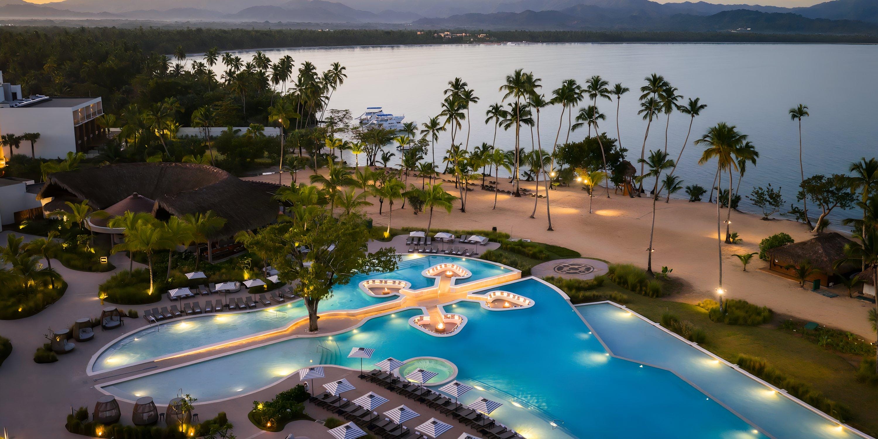 Aerial view of Hilton Cancun Mar Caribe, perfect for a destination wedding with pool, beach, and sunset.