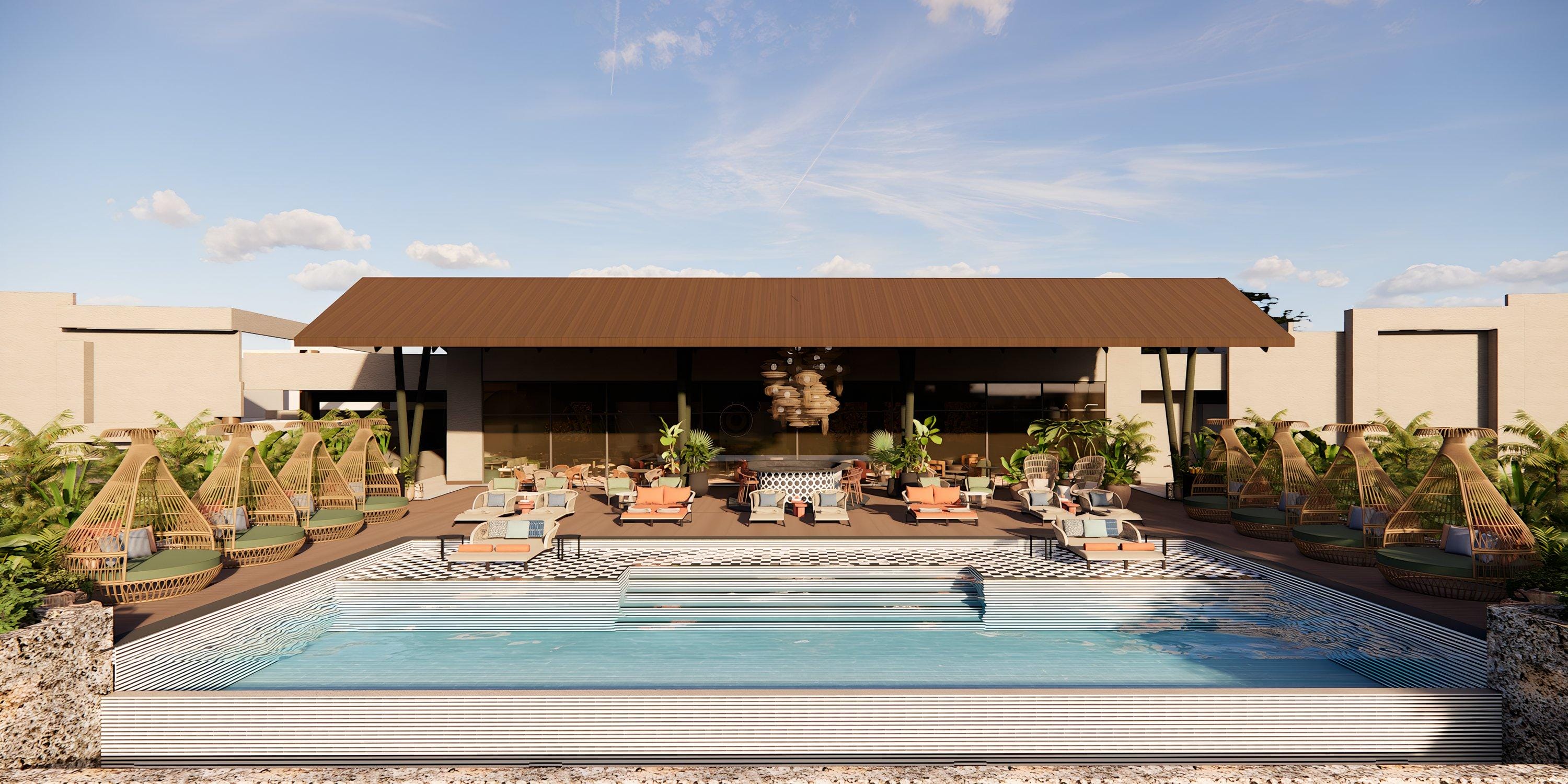 Hilton Cancun Mar Caribe: Outdoor pool with lounge chairs, cabanas—ideal for a destination wedding.