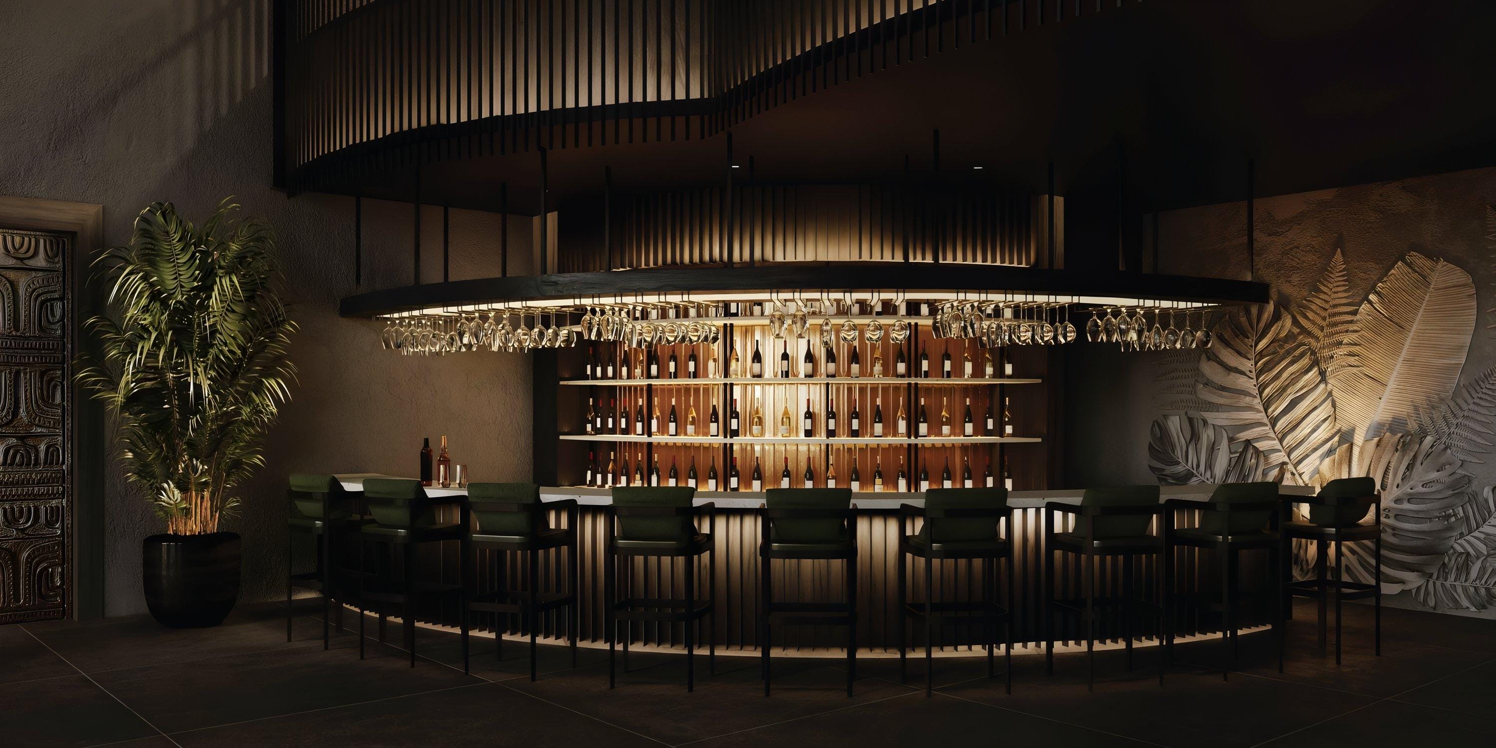 Chic bar at Lopesan Serenity Bay Resort Spa & Casino, perfect for destination weddings—dark seats, backlit shelves, and lush plants.