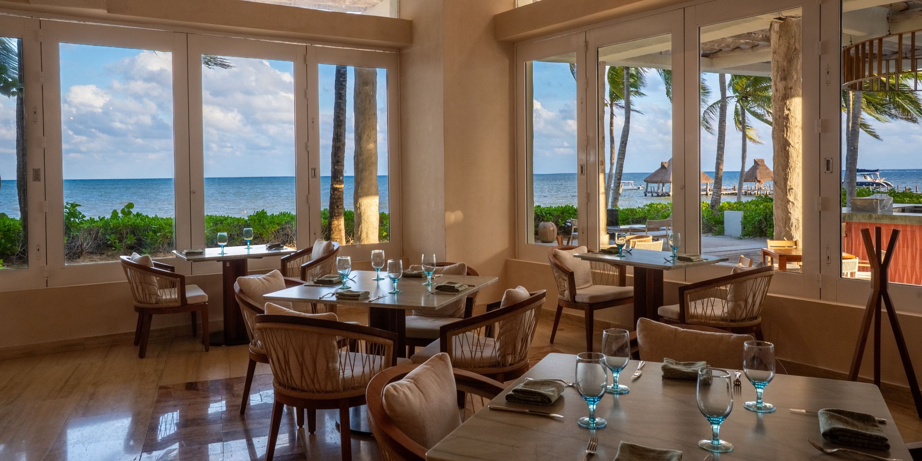 Elegant table settings with ocean views—an ideal spot for your dream destination wedding.