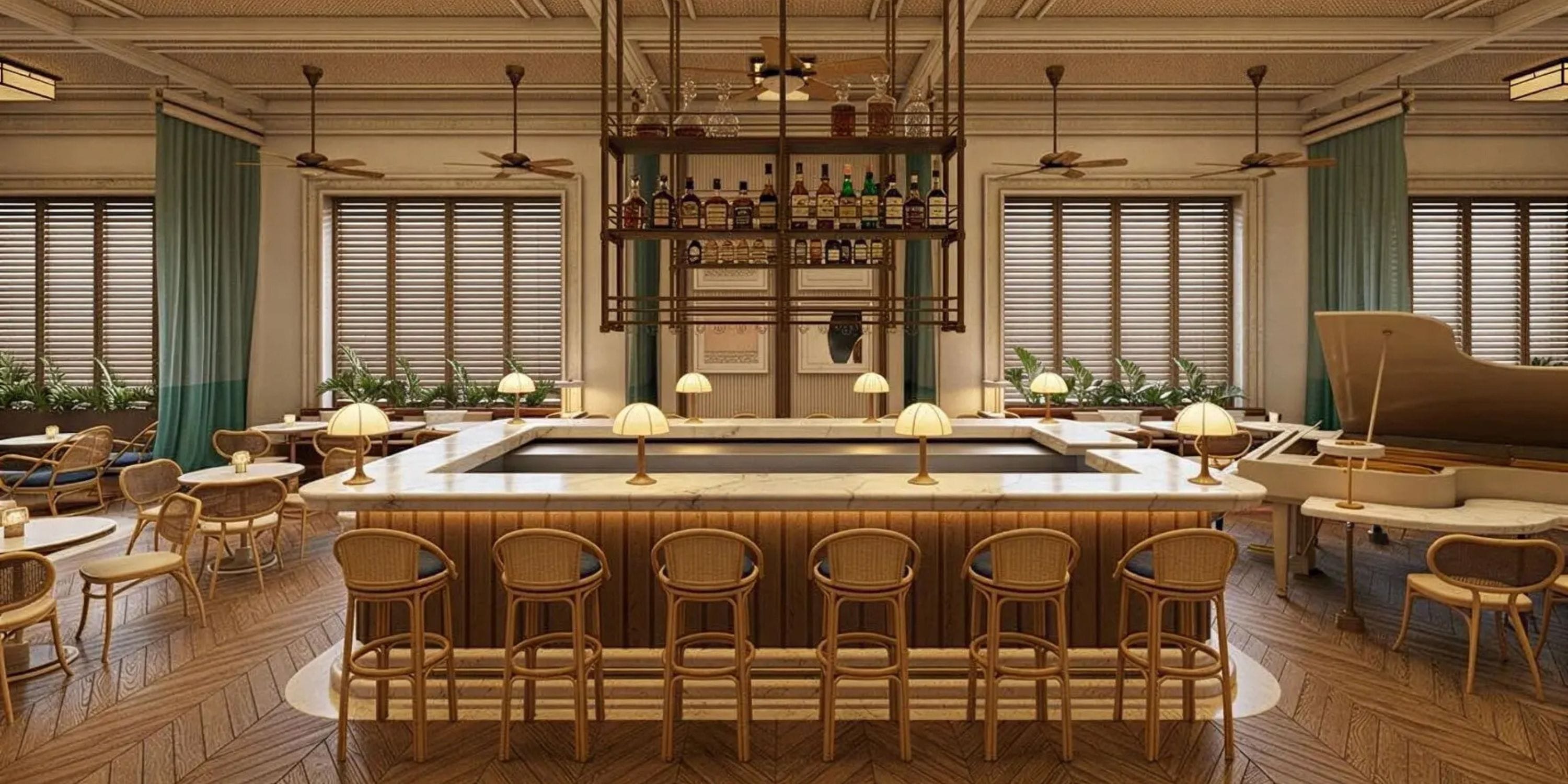 Stylish UNICO 18°77° Montego Bay bar—perfect for a destination wedding, with piano and marble top.